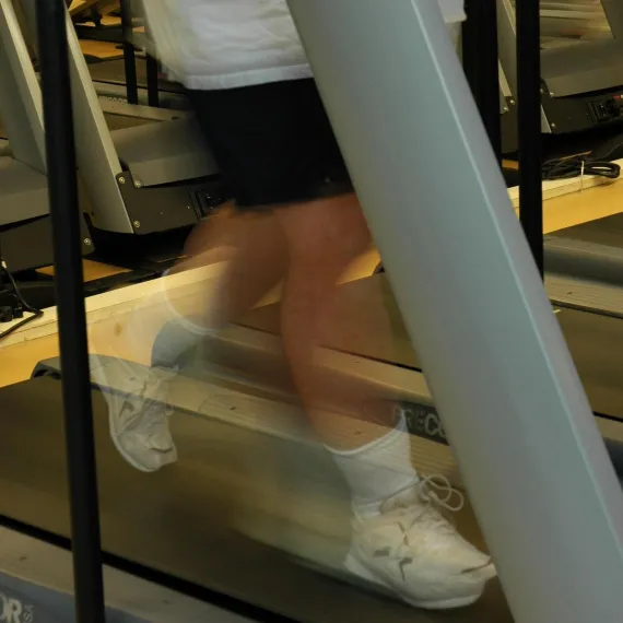 feet walking on treadmill