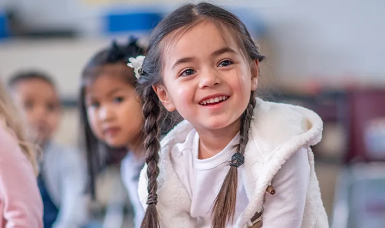 Young girl in her classroom