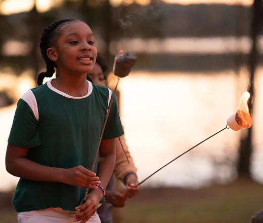 Girl making smores
