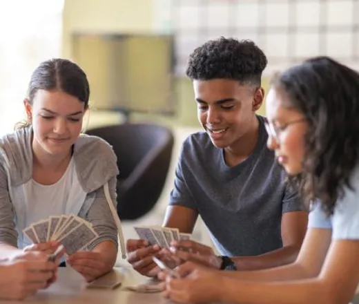 Teens Playing Card Game