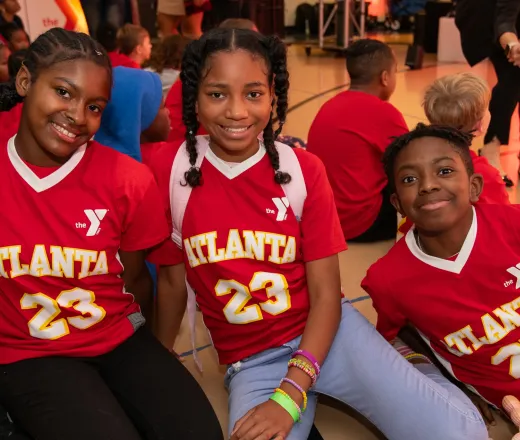 YMCA Youth celebrating Atlanta Hawks Jersey Patch Partnership