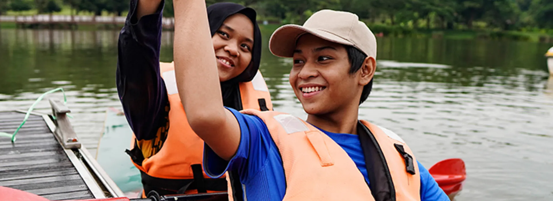 2 teenagers in a kayak